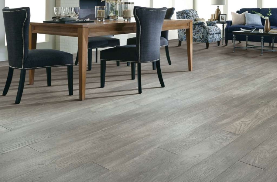 Gray wood floors in a dining room setting