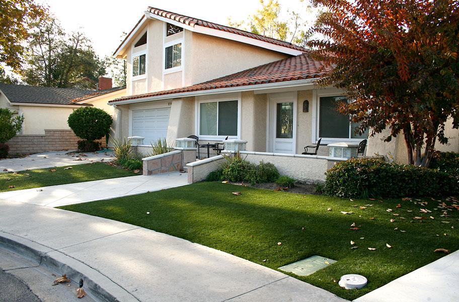 Landscape artificial turf in a residential setting