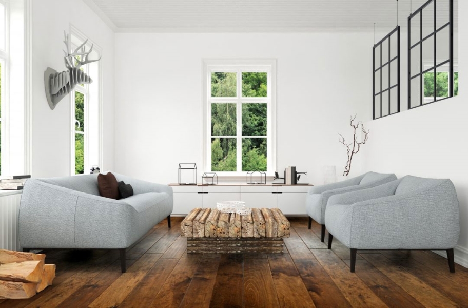Handscraped wood flooring in a living room setting. 